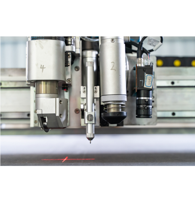 What are the main uses of a vibrating knife cutting machine?